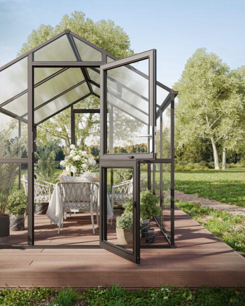 Gewächshaus Aptasia 4 als Wintergarten genutzt in einem Garten